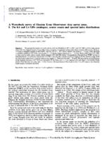 A Westerbork survey of Einstein X-ray Observatory deep survey areas. I - The 0.6 and 1.4 GHz catalogues, source counts and spectral index distributions