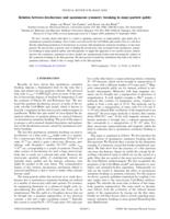 Relation between decoherence and spontaneous symmetry breaking in many-particle qubits