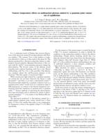 Nonzero temperature effects on antibunched photons emitted by a quantum point contact out of equilibrium