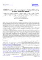 GOODS-Herschel: radio-excess signature of hidden AGN activity in distant star-forming galaxies