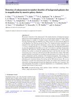 Detection of enhancement in number densities of background galaxies due to magnification by massive galaxy clusters