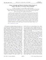 Charge catastrophe and dielectric breakdown during exposure of organic thin films to low-energy electron radiation