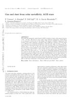 Gas and dust from solar metallicity AGB stars