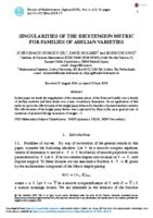 Singularities of the biextension metric for families of abelian varieties