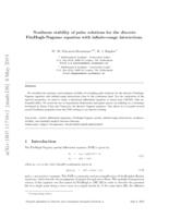 Nonlinear stability of pulse solutions for the discrete FitzHugh-Nagumo equation with infinite-range interactions
