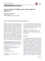 Contact mechanics of highly porous oxide nanoparticle agglomerates