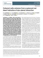 Coherent radio emission from a quiescent red dwarf indicative of star-planet interaction