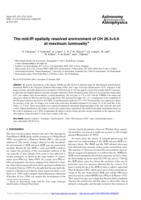 The mid-IR spatially resolved environment of OH 26.5+0.6 at maximum luminosity