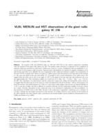 VLBI, MERLIN and HST observations of the giant radio galaxy 3C 236