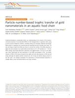 Particle number-based trophic transfer of gold nanomaterials in an aquatic food chain