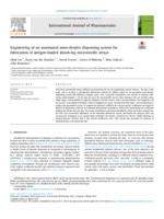 Engineering of an automated nano-droplet dispensing system for fabrication of antigen-loaded dissolving microneedle arrays