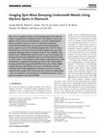 Imaging spin-wave damping underneath metals using electron spins in diamond