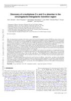 Discovery of a multiphase O VI and O VII absorber in the circumgalactic/intergalactic transition region