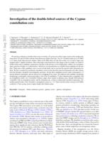 Investigation of the double-lobed sources of the Cygnus constellation core