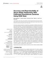 Accuracy and reproducibility of above-water radiometry with calibrated smartphone cameras using RAW data